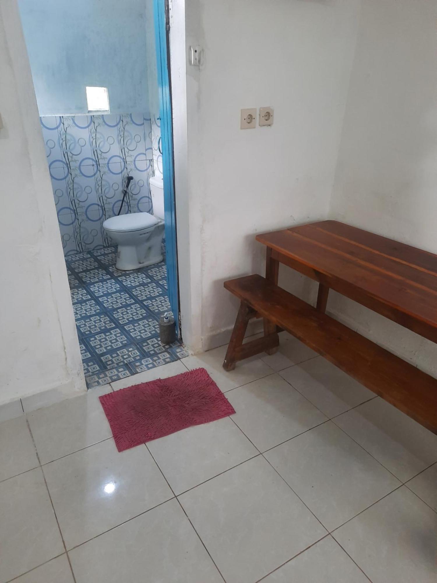 Red Beach Homestay Pasanggaran Pokoj fotografie
