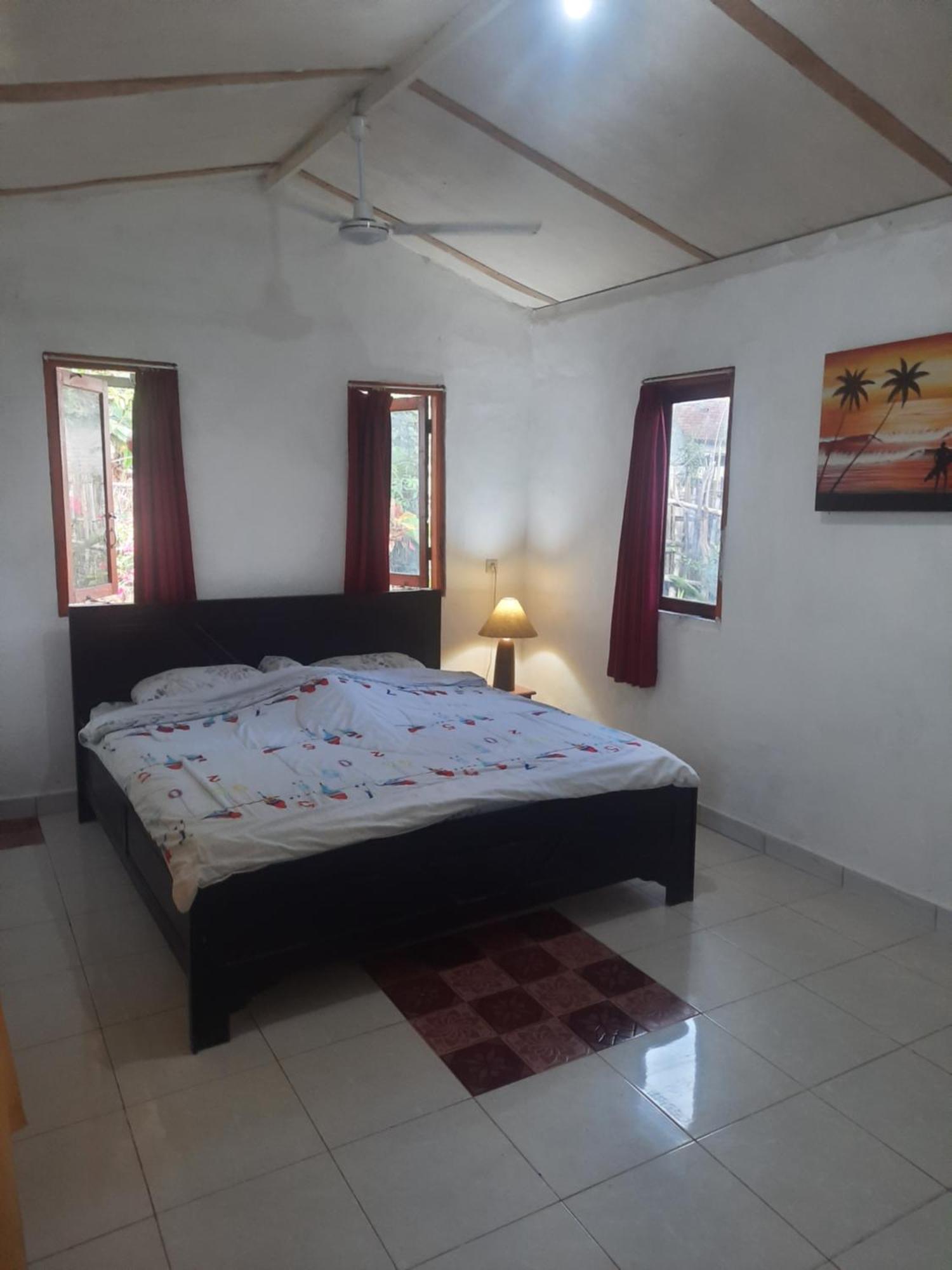 Red Beach Homestay Pasanggaran Pokoj fotografie