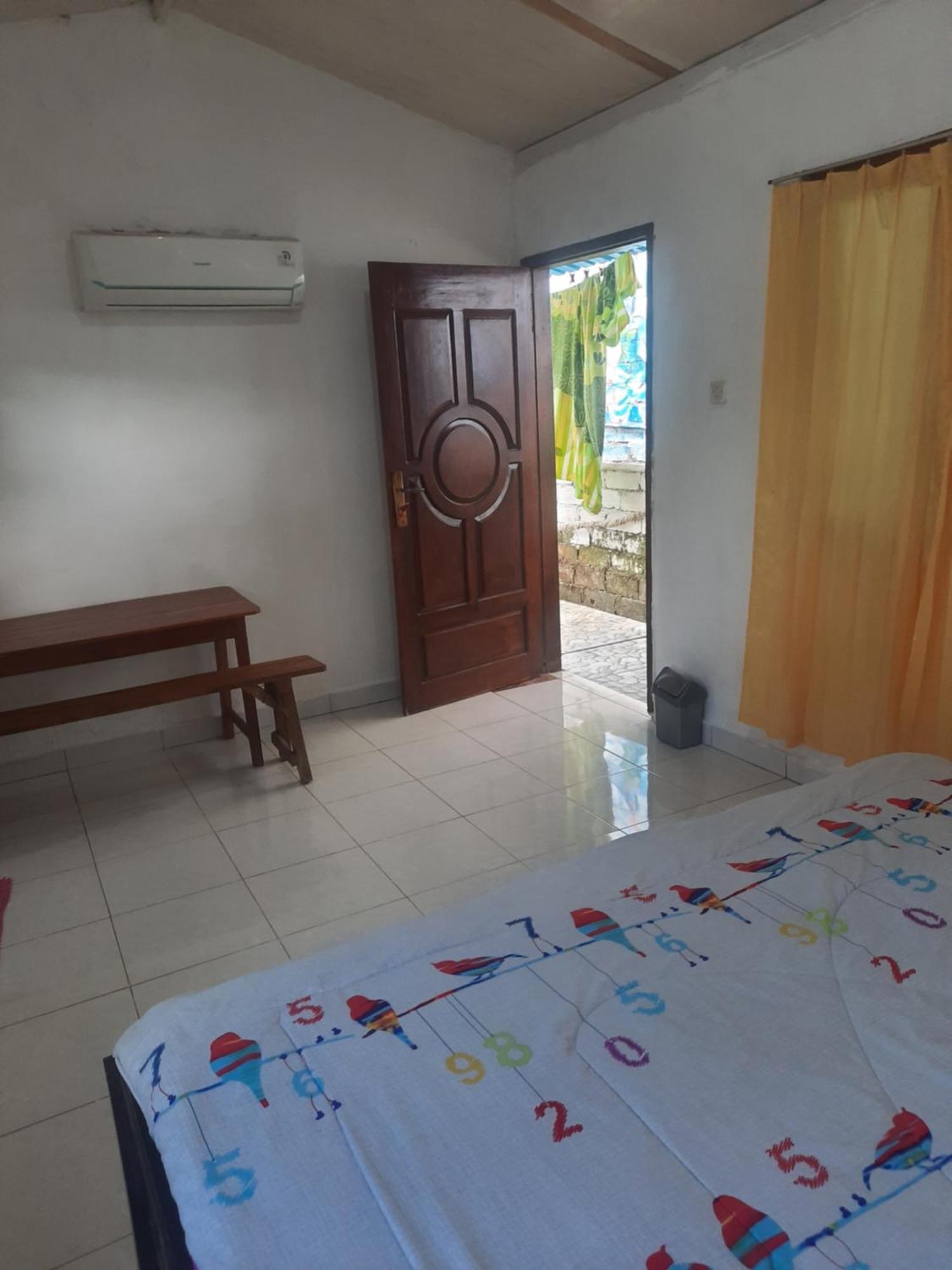 Red Beach Homestay Pasanggaran Pokoj fotografie